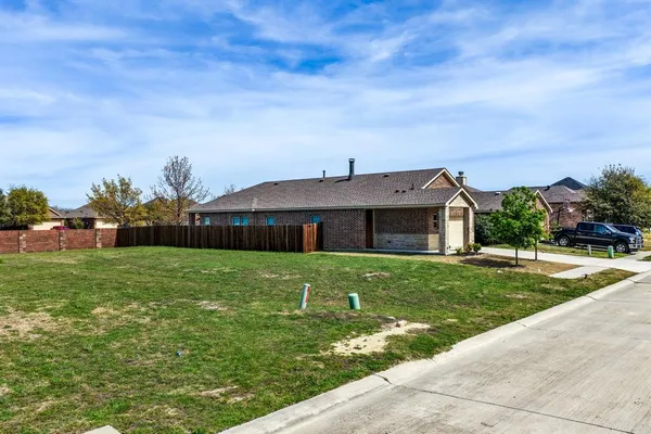 a house view with a garden space