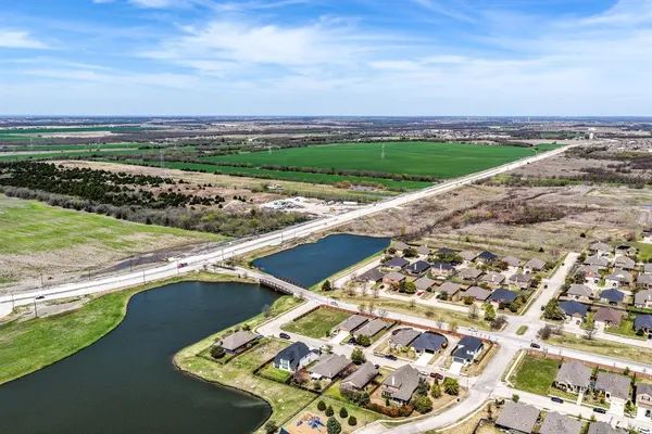 a view of a city with an ocean view