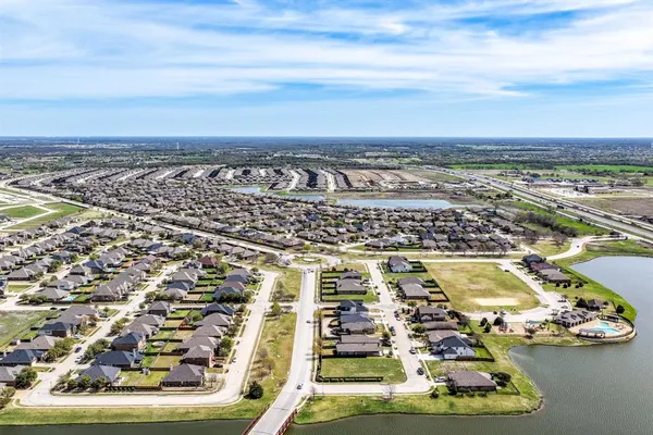 an aerial view of residential building with ocean view