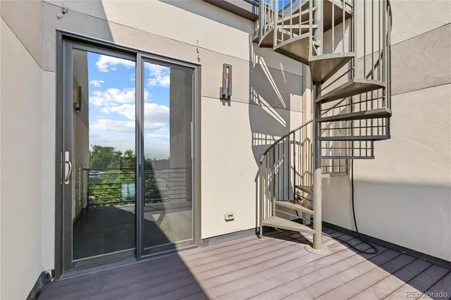 a view of an entryway with hardwood