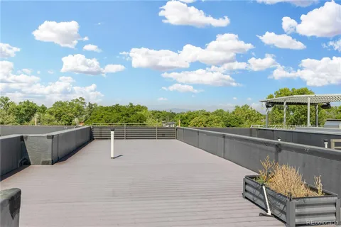 a view of a swimming pool with a terrace