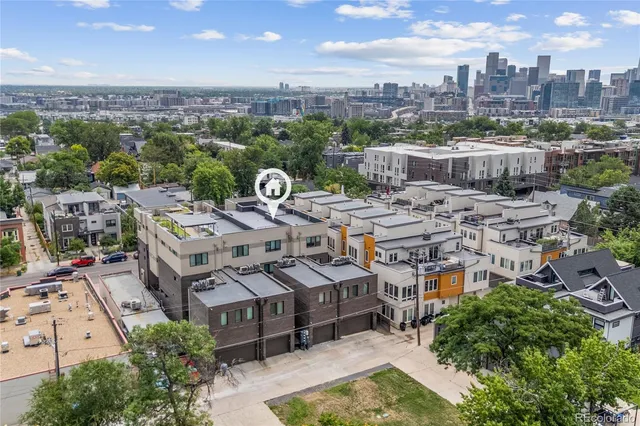a view of a city with tall buildings