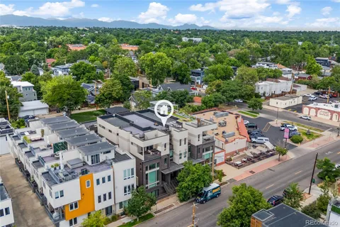 an aerial view of a city with lots of residential buildings