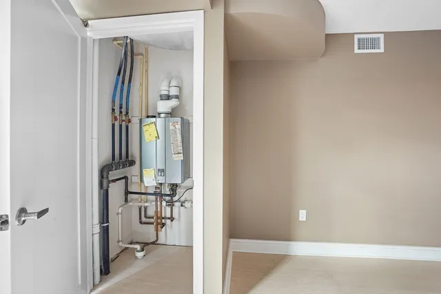 a view of a bathroom from a hallway