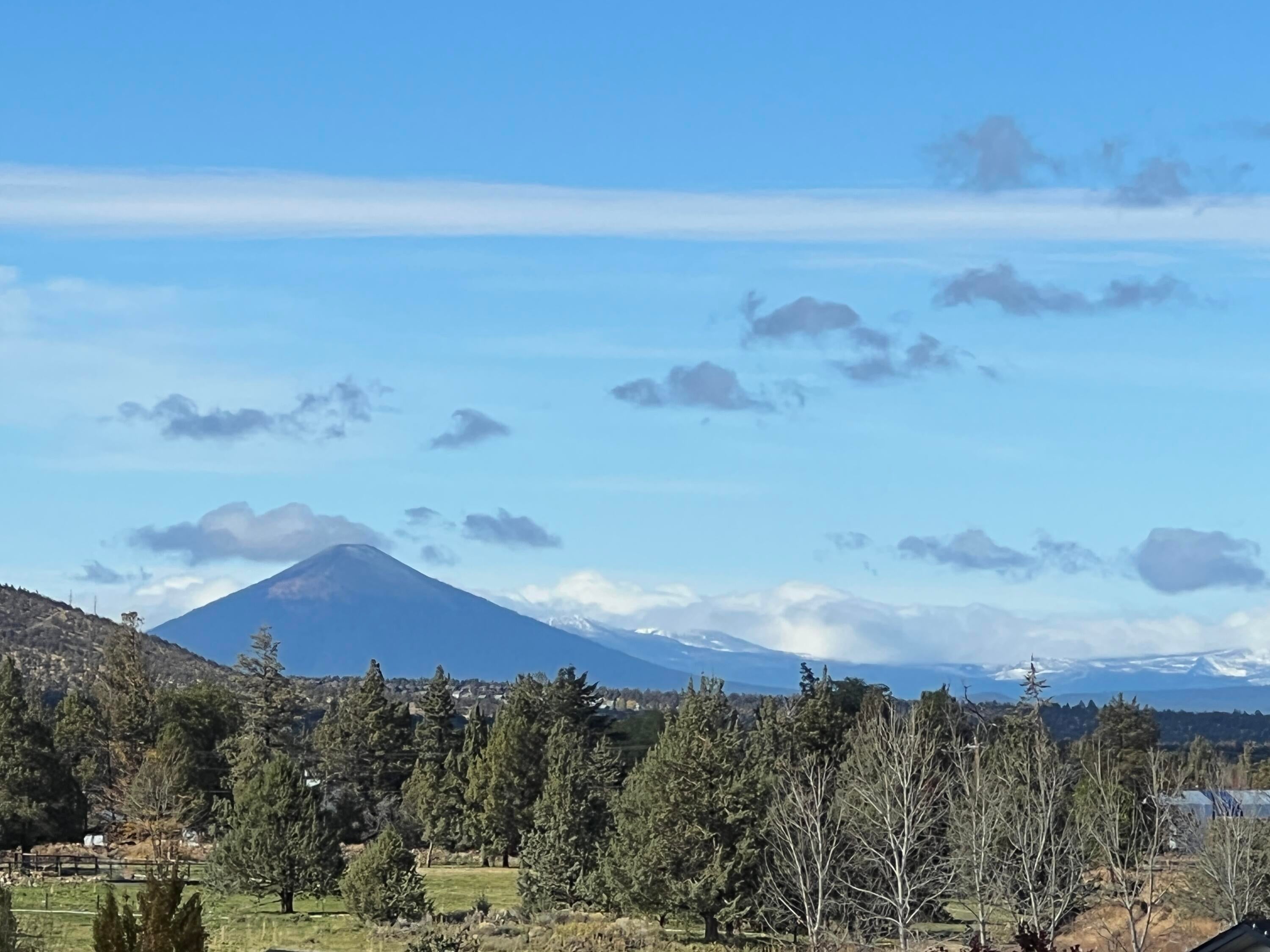 3405 Southwest 45th Street Redmond, OR 97756 - Photo 66 of 76 On a clear day, you can see forever, this is Black Butte, Mt Jefferson in the clouds