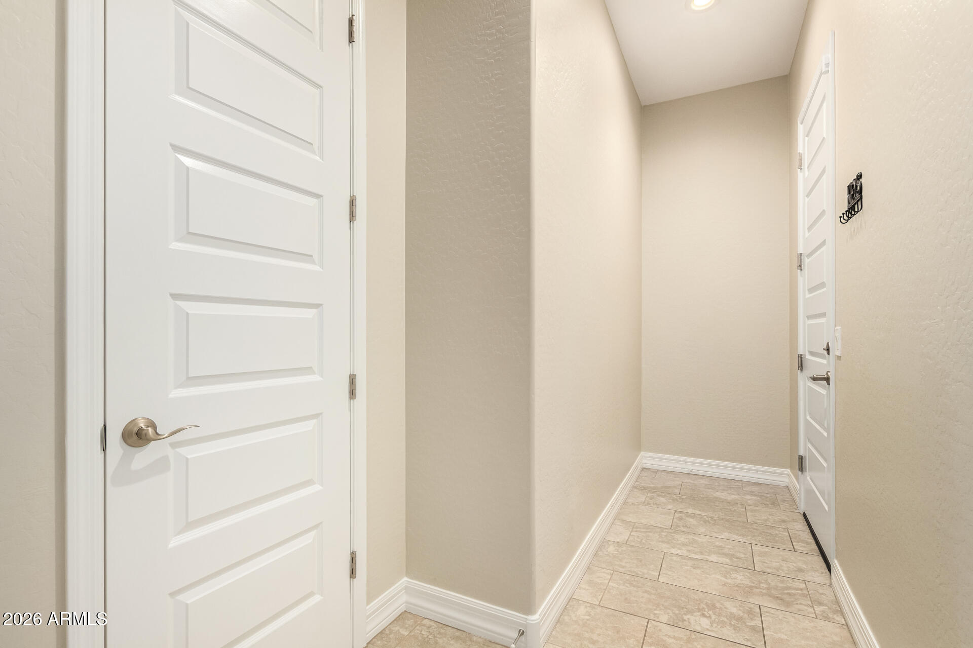 3888 East Chestnut Lane Gilbert, AZ 85298 - Photo 35 of 63 Storage Closet / Entrance to Garage