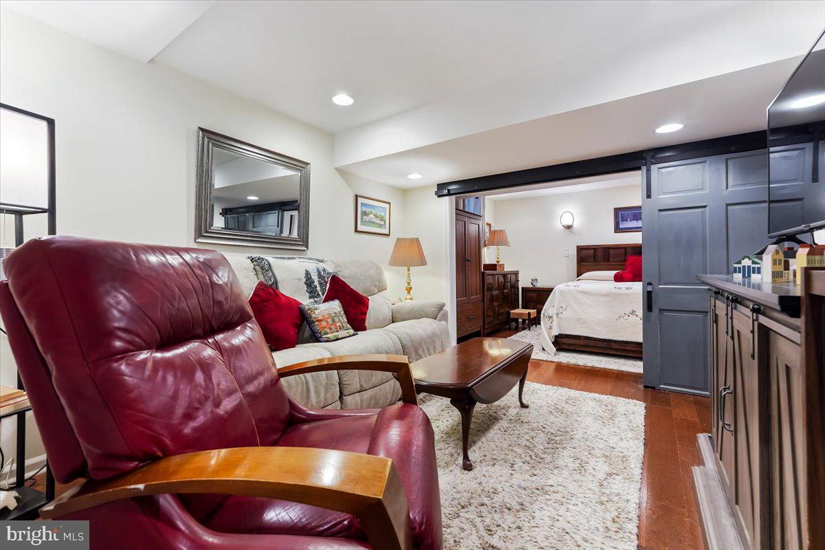 43 North Hawthorne Road, Unit LL Coatesville, PA 19320 - Photo 5 of 27 a living room with furniture and a flat screen tv