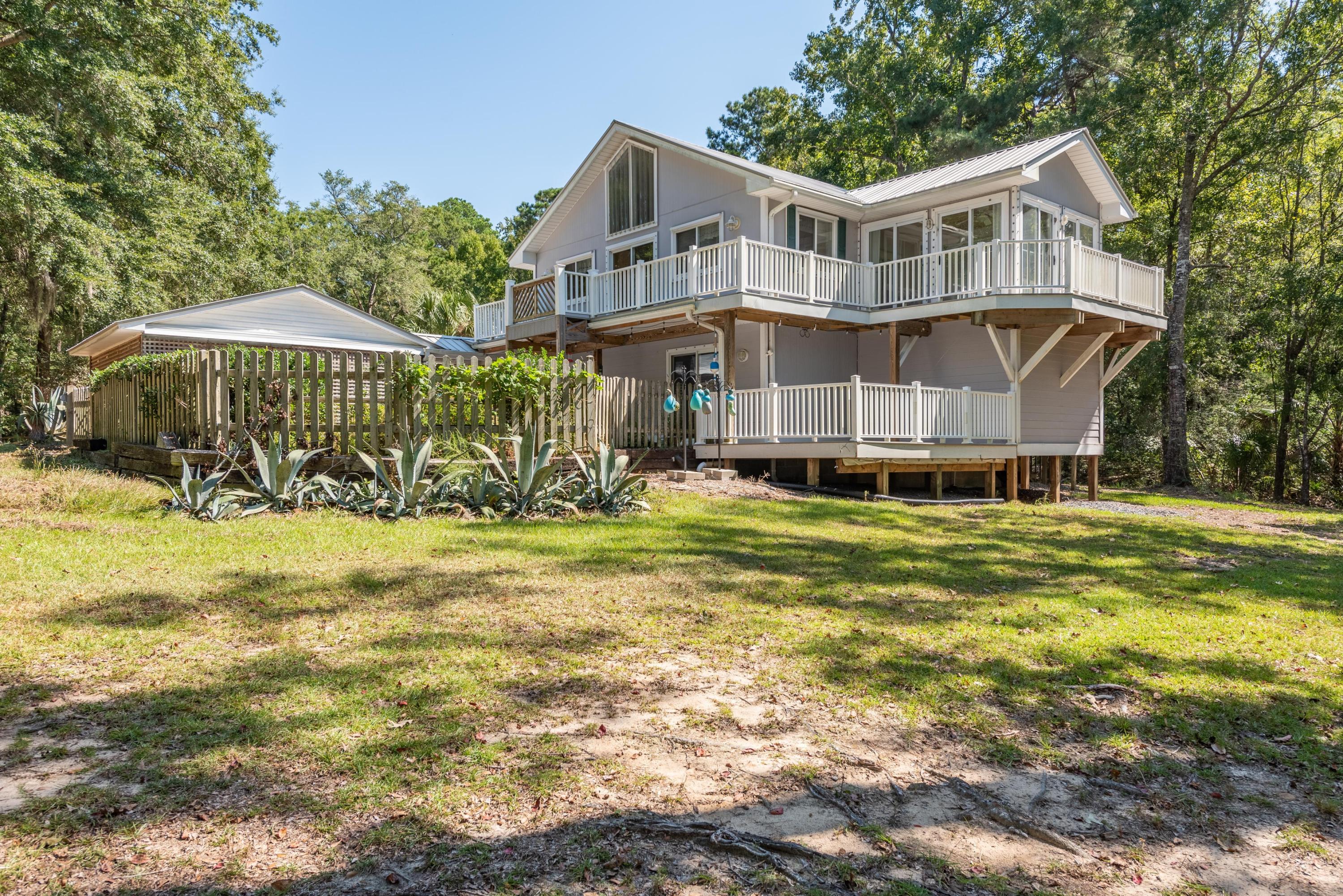 1483 Ravens Bluff Road Johns Island, SC 29455 - Photo 1 of 36 CoastalREphoto1483RavensBluff-30