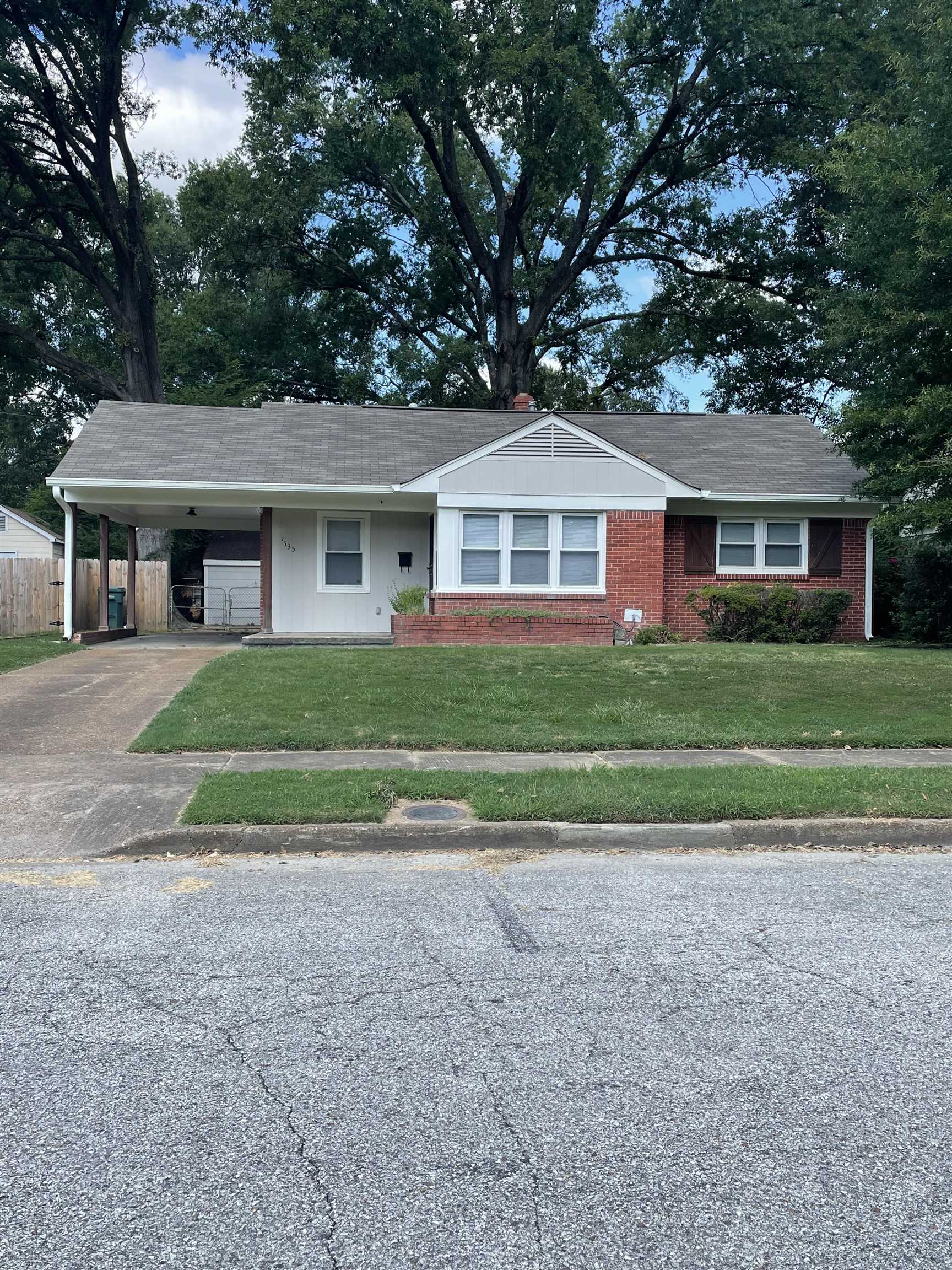 1535 Welsh Road Memphis, TN 38117 - Photo 1 of 2 a front view of house with yard and green space