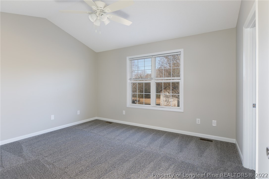 1119 Live Oak Road Coats, NC 27521 - Photo 17 of 23 an empty room with a window