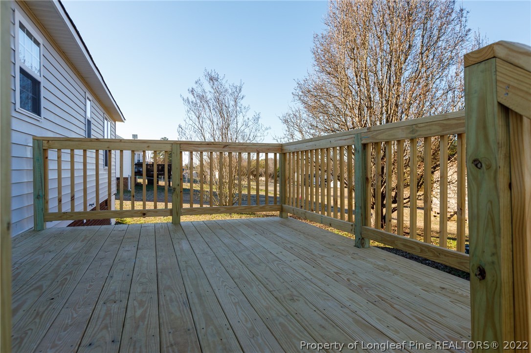 1119 Live Oak Road Coats, NC 27521 - Photo 20 of 23 a view of deck with wooden floor and fence