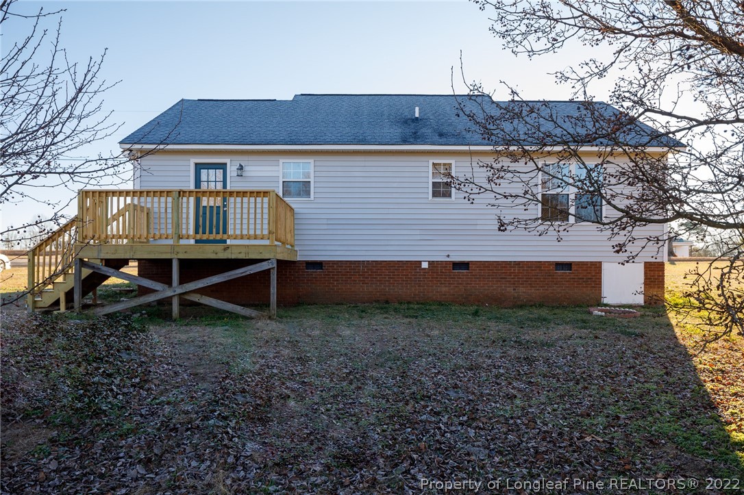 1119 Live Oak Road Coats, NC 27521 - Photo 23 of 23 a house view with a garden space