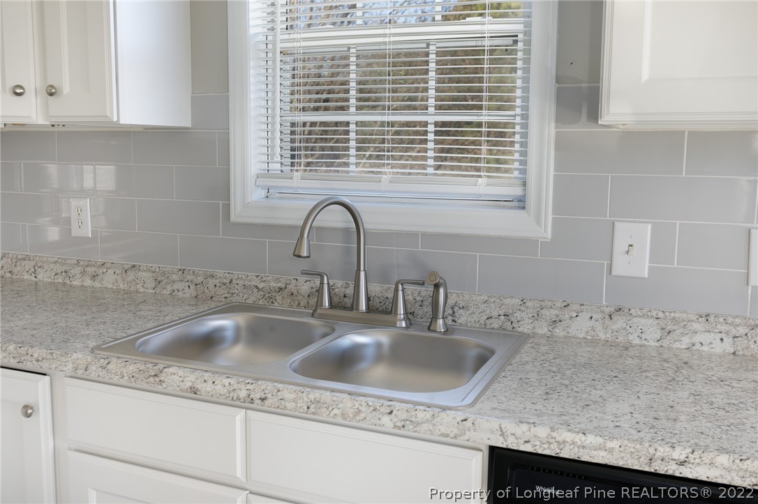 1119 Live Oak Road Coats, NC 27521 - Photo 9 of 23 a close view of sink and tap