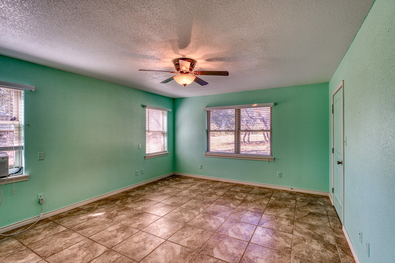 1129 Lonesome Loop Blanco, TX 78606 - Photo 17 of 40 Master bedroom