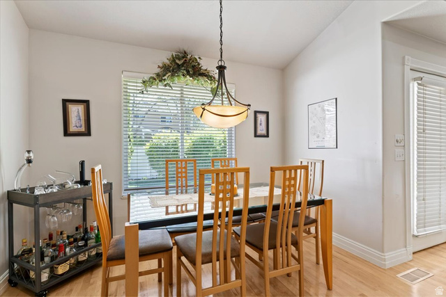 1924 North 2000th Street East Layton, UT 84040 - Photo 16 of 41 Dining space with light wood finished floors and baseboards