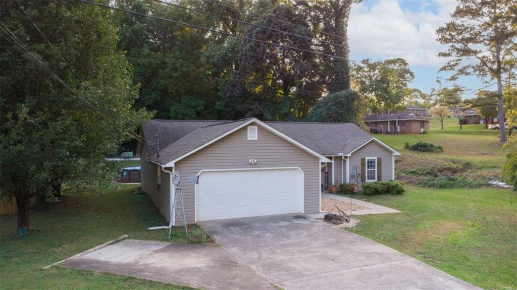 a house with trees in the background