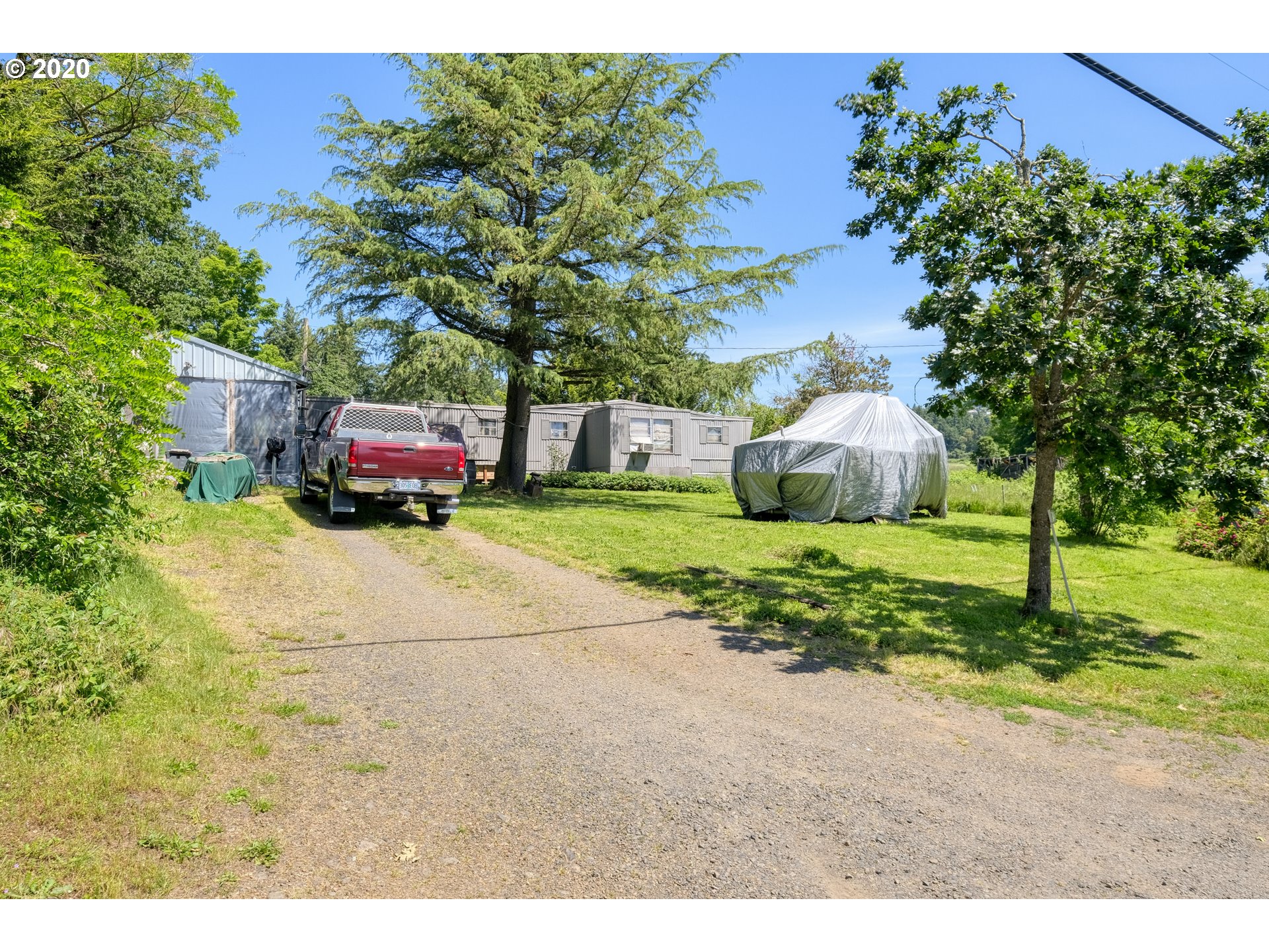 30575 Northeast Fernwood Road Newberg, OR 97132 - Photo 12 of 20 a house view with a garden space