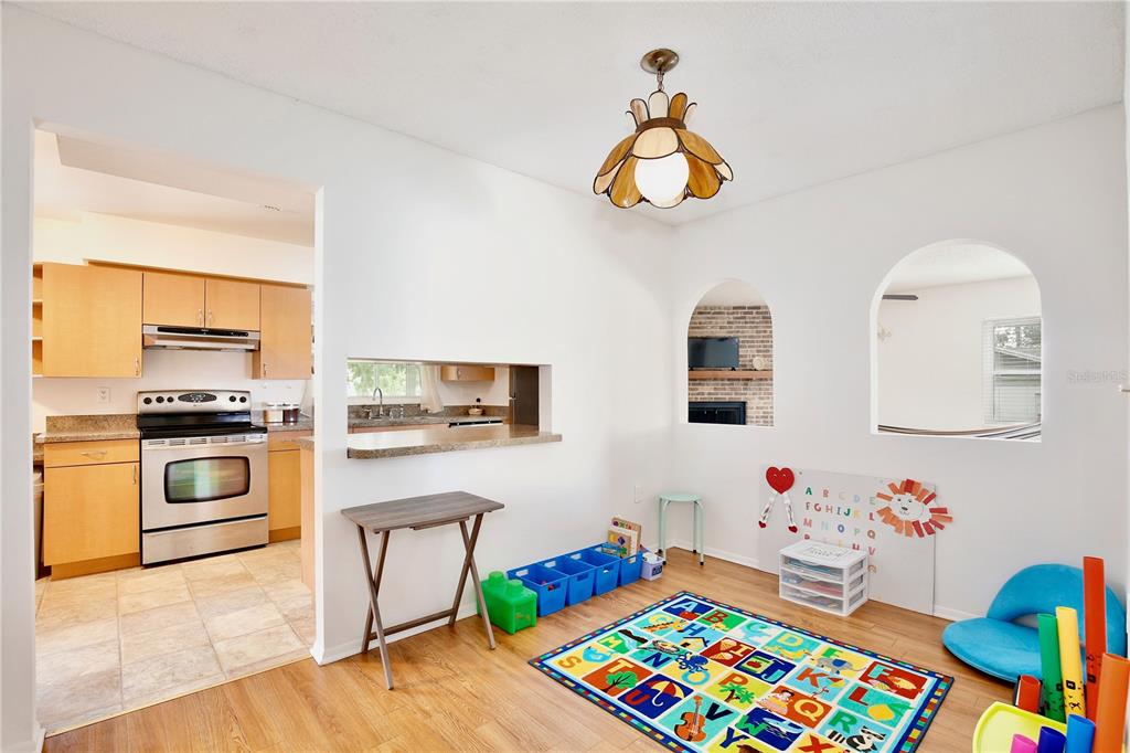 1179 Shadow Run Drive Lakeland, FL 33813 - Photo 12 of 42 a bedroom with furniture and a wooden floor