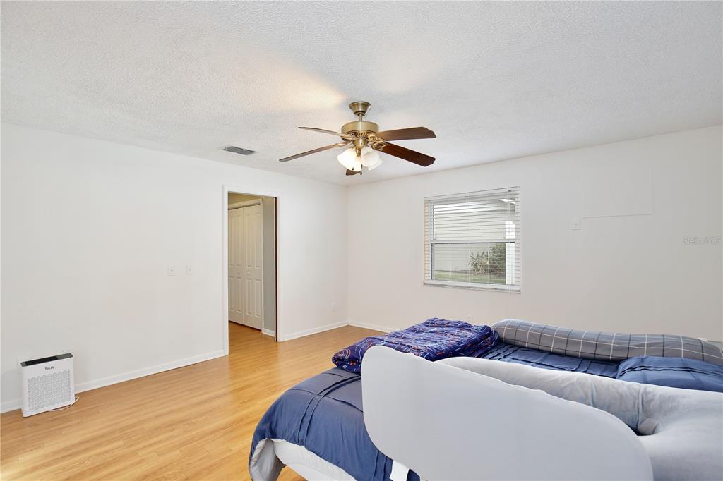 1179 Shadow Run Drive Lakeland, FL 33813 - Photo 21 of 42 a living room with furniture and a ceiling fan