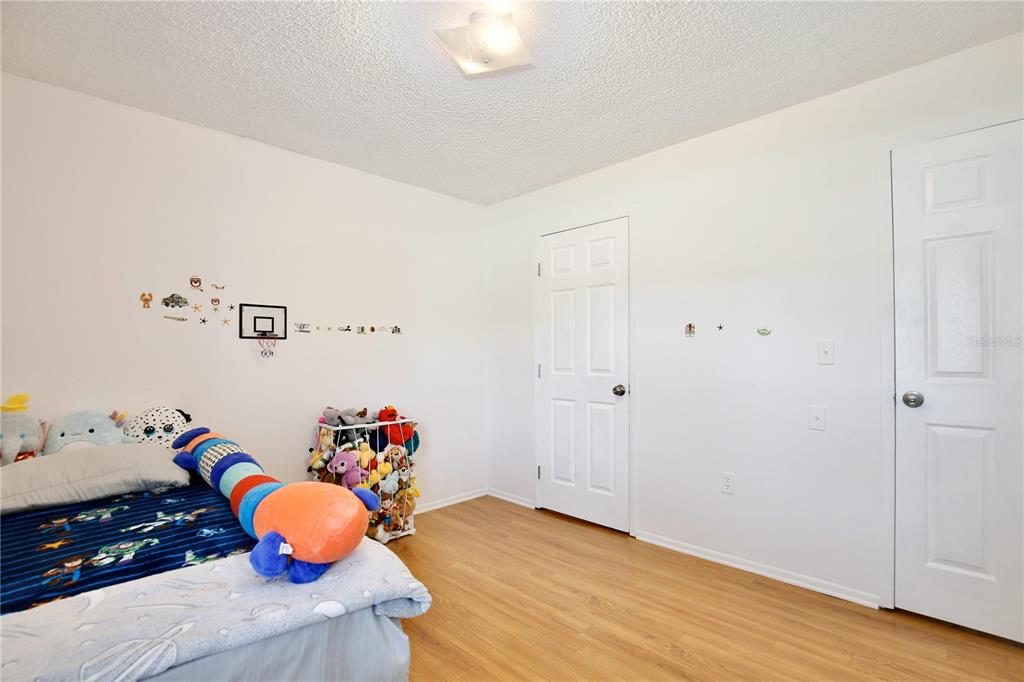 1179 Shadow Run Drive Lakeland, FL 33813 - Photo 26 of 42 a room with furniture and wooden floor