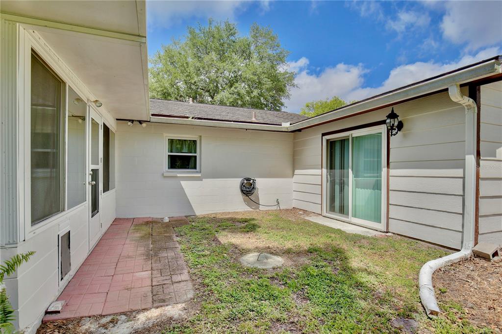1179 Shadow Run Drive Lakeland, FL 33813 - Photo 30 of 42 a front view of a house with a yard