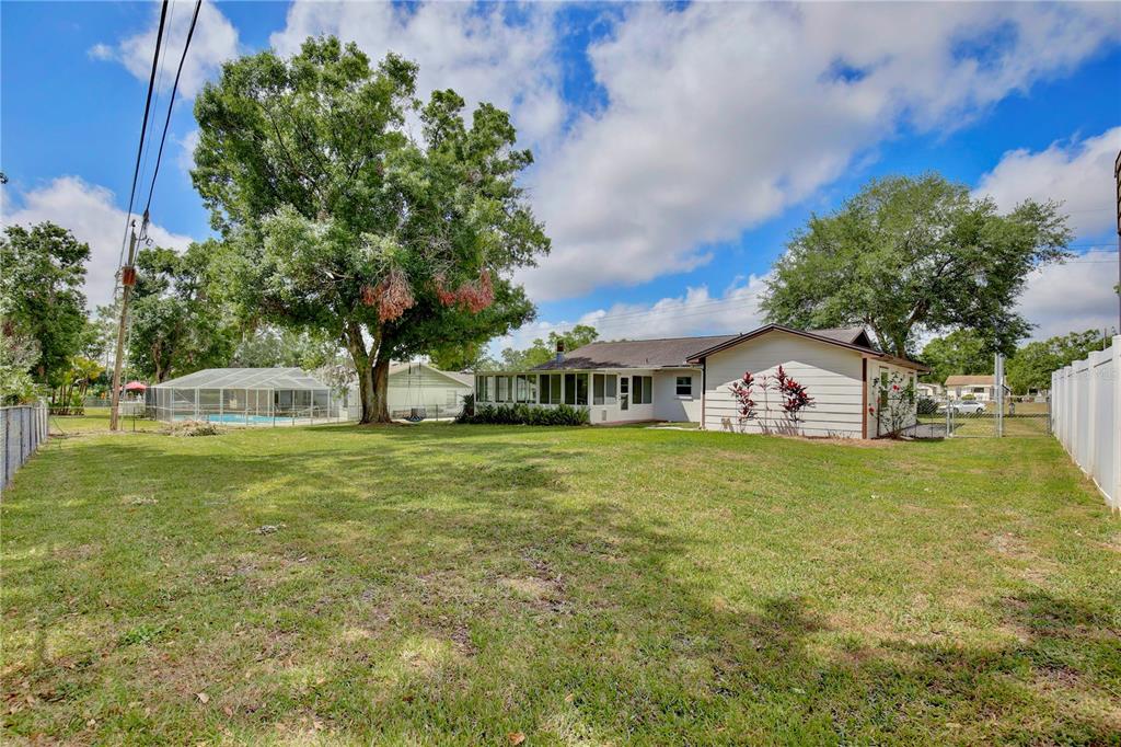 1179 Shadow Run Drive Lakeland, FL 33813 - Photo 31 of 42 a front view of a house with garden