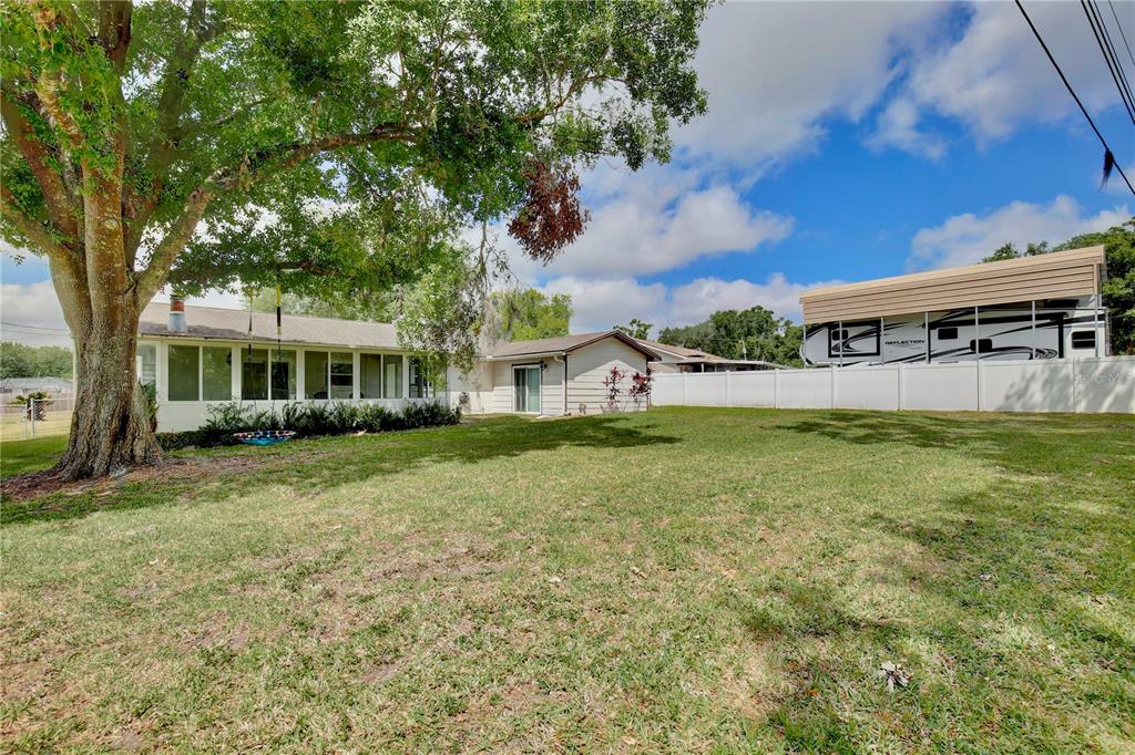 1179 Shadow Run Drive Lakeland, FL 33813 - Photo 32 of 42 a front view of a house with a yard