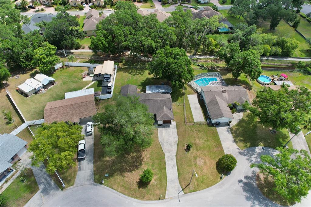 1179 Shadow Run Drive Lakeland, FL 33813 - Photo 37 of 42 an aerial view of a house with a yard and a large tree