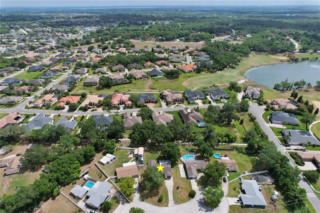 1179 Shadow Run Drive Lakeland, FL 33813 - Photo 41 of 42 an aerial view of a city with lots of residential buildings