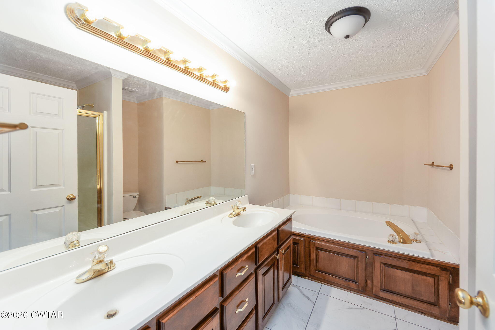 8 Sebastian Drive Jackson, TN 38305 - Photo 12 of 23 a bathroom with a tub sink and mirror