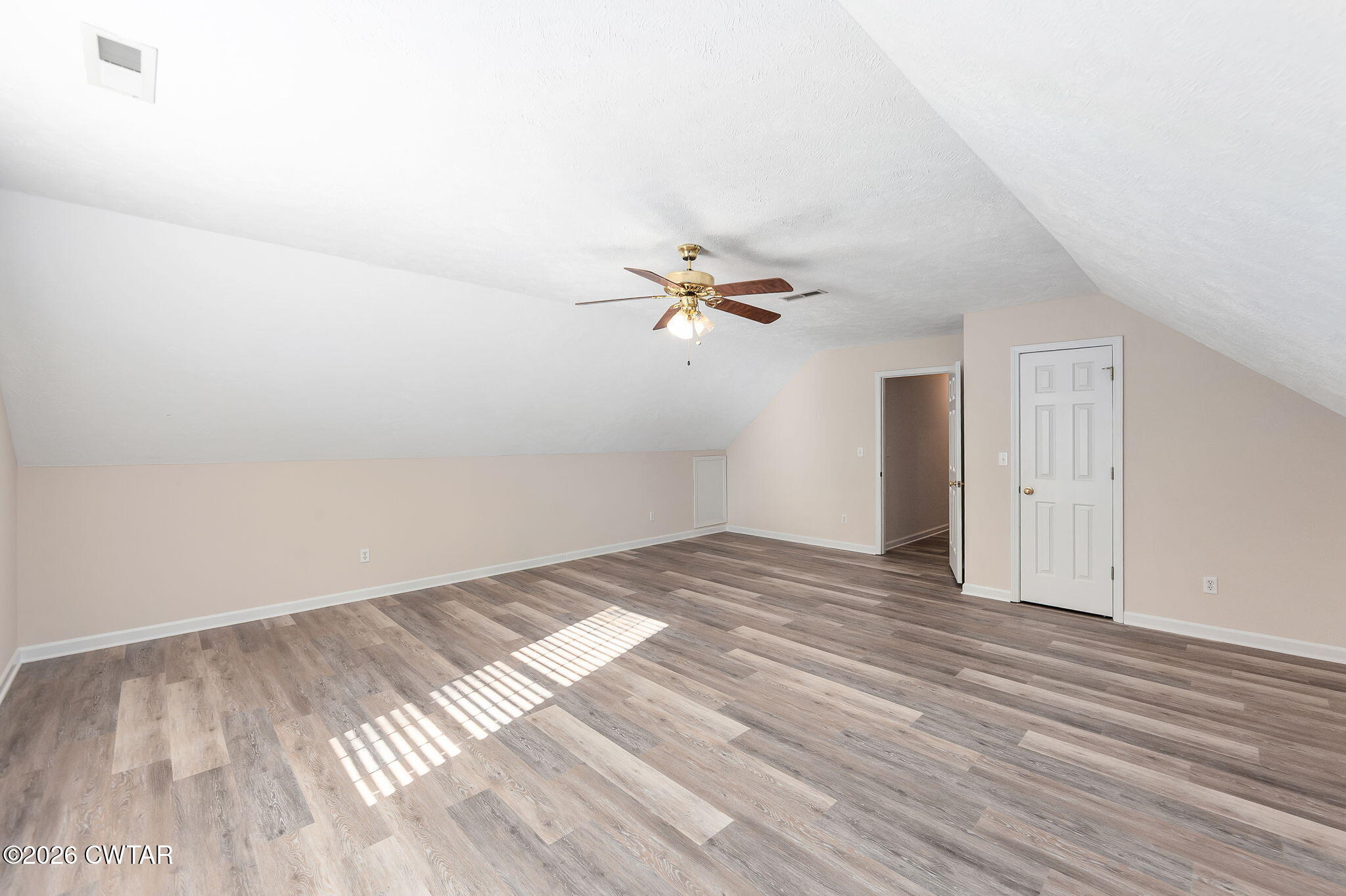 8 Sebastian Drive Jackson, TN 38305 - Photo 13 of 23 a view of a room with wooden floor and ceiling fan
