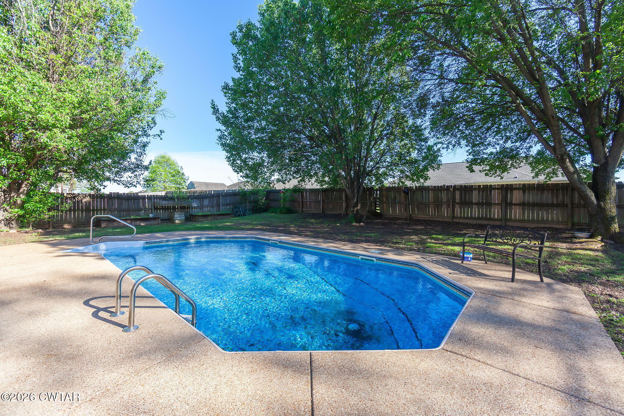 8 Sebastian Drive Jackson, TN 38305 - Photo 16 of 23 a view of a swimming pool with a patio