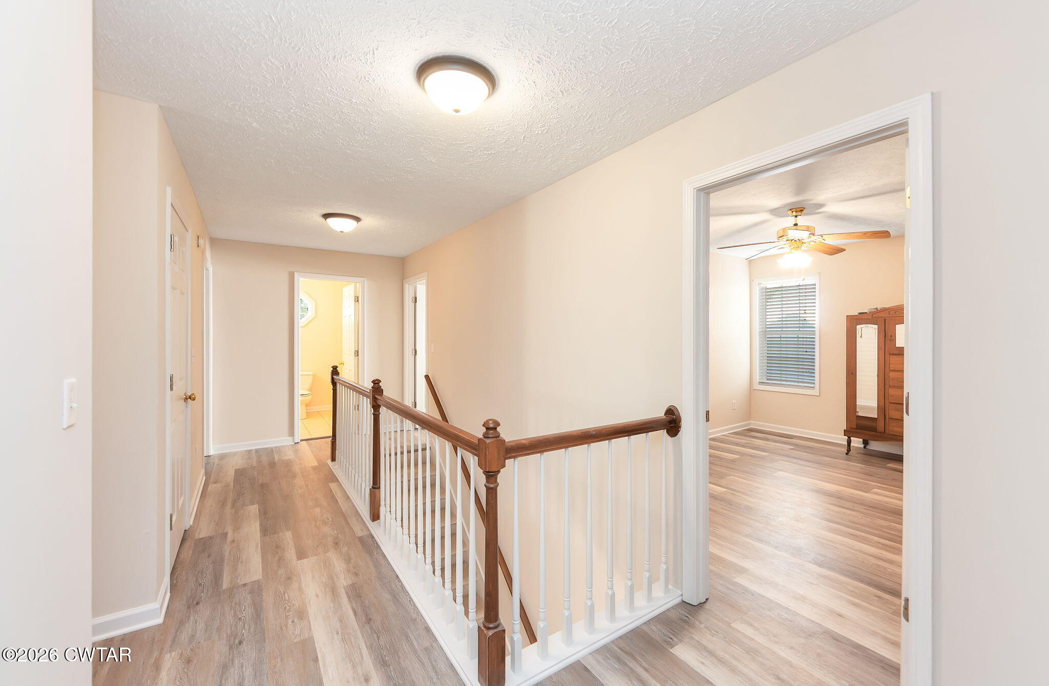 8 Sebastian Drive Jackson, TN 38305 - Photo 17 of 23 a view of a hallway with wooden floor