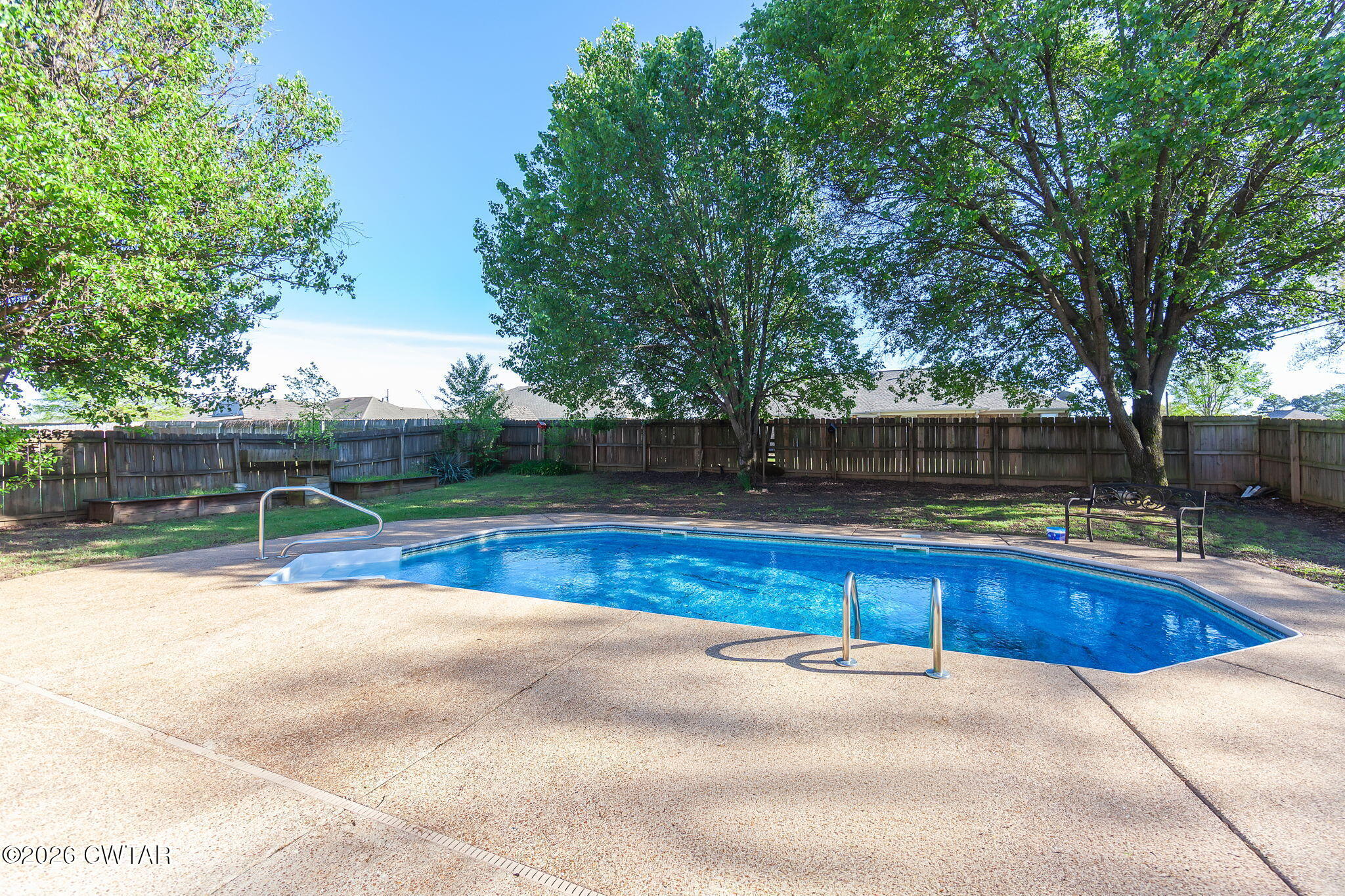 8 Sebastian Drive Jackson, TN 38305 - Photo 18 of 23 a view of swimming pool with a yard
