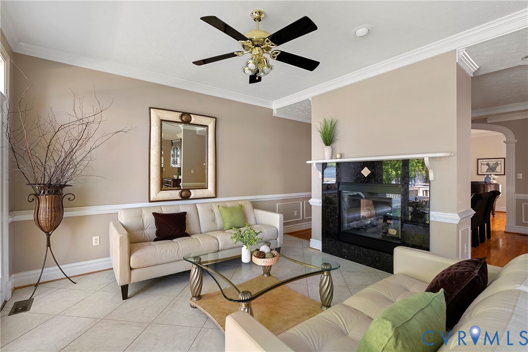 5213 Clipper Cove Road Midlothian, VA 23112 - Photo 14 of 73 Living area featuring tile flooring, crown molding