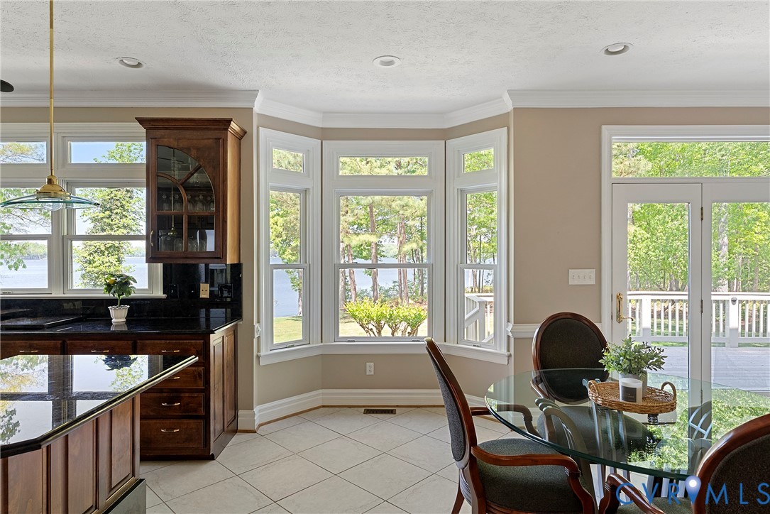 5213 Clipper Cove Road Midlothian, VA 23112 - Photo 17 of 73 This inviting space features a kitchen with dark g
