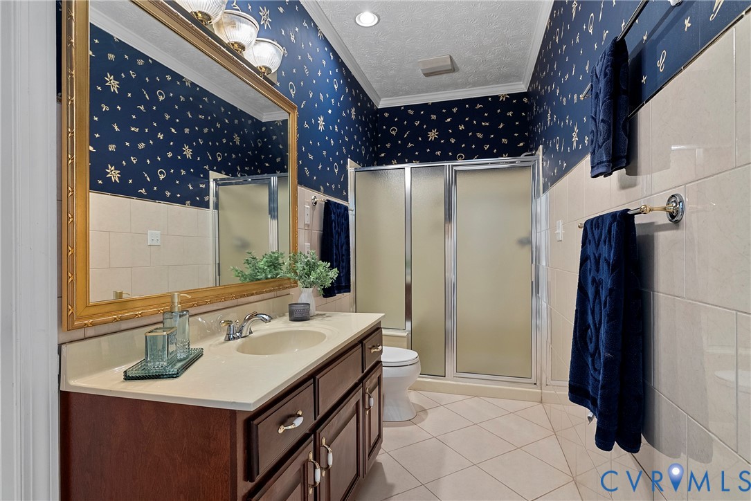 5213 Clipper Cove Road Midlothian, VA 23112 - Photo 24 of 73 Bathroom featuring a shower with a frosted glass e