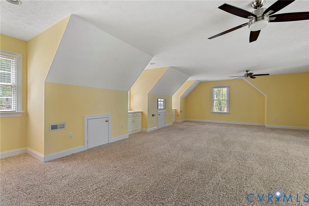 5213 Clipper Cove Road Midlothian, VA 23112 - Photo 31 of 73 Spacious room featuring vaulted ceilings, two wind
