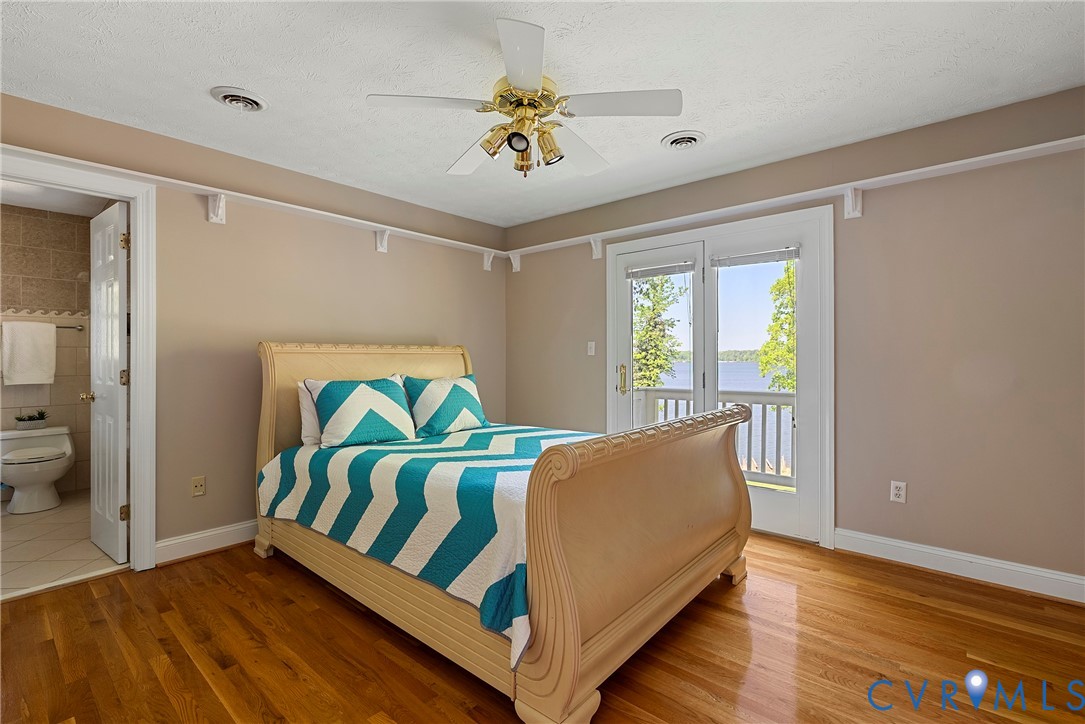 5213 Clipper Cove Road Midlothian, VA 23112 - Photo 38 of 73 The room features hardwood floors, a ceiling fan,