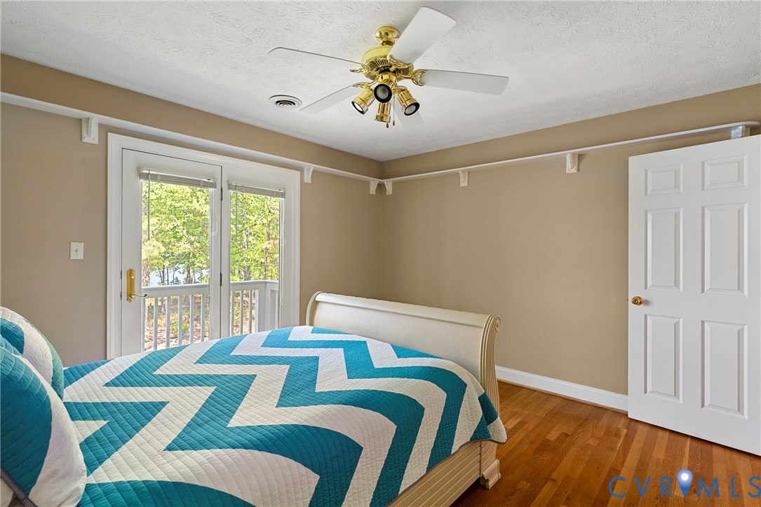 5213 Clipper Cove Road Midlothian, VA 23112 - Photo 39 of 73 This room features hardwood floors, a white panele