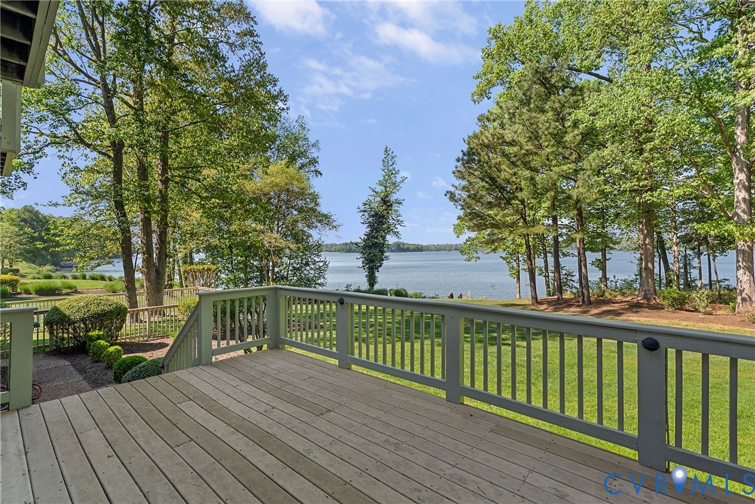5213 Clipper Cove Road Midlothian, VA 23112 - Photo 4 of 73 Spacious outdoor deck with a wooden surface and li