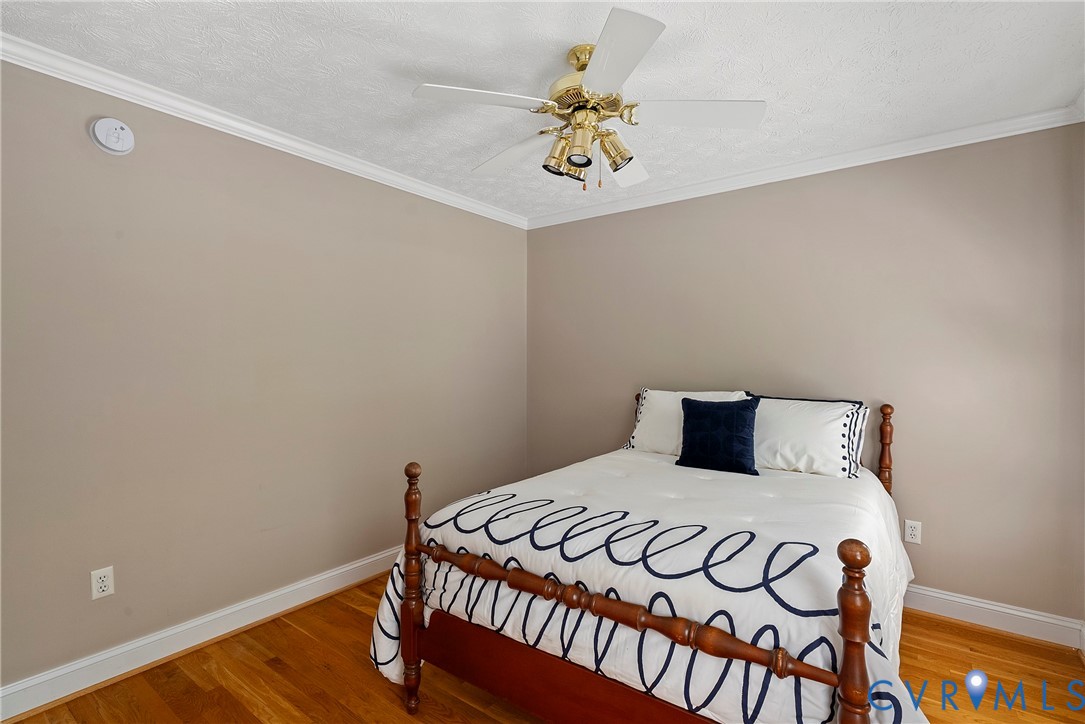 5213 Clipper Cove Road Midlothian, VA 23112 - Photo 44 of 73 This room features hardwood flooring, crown moldin