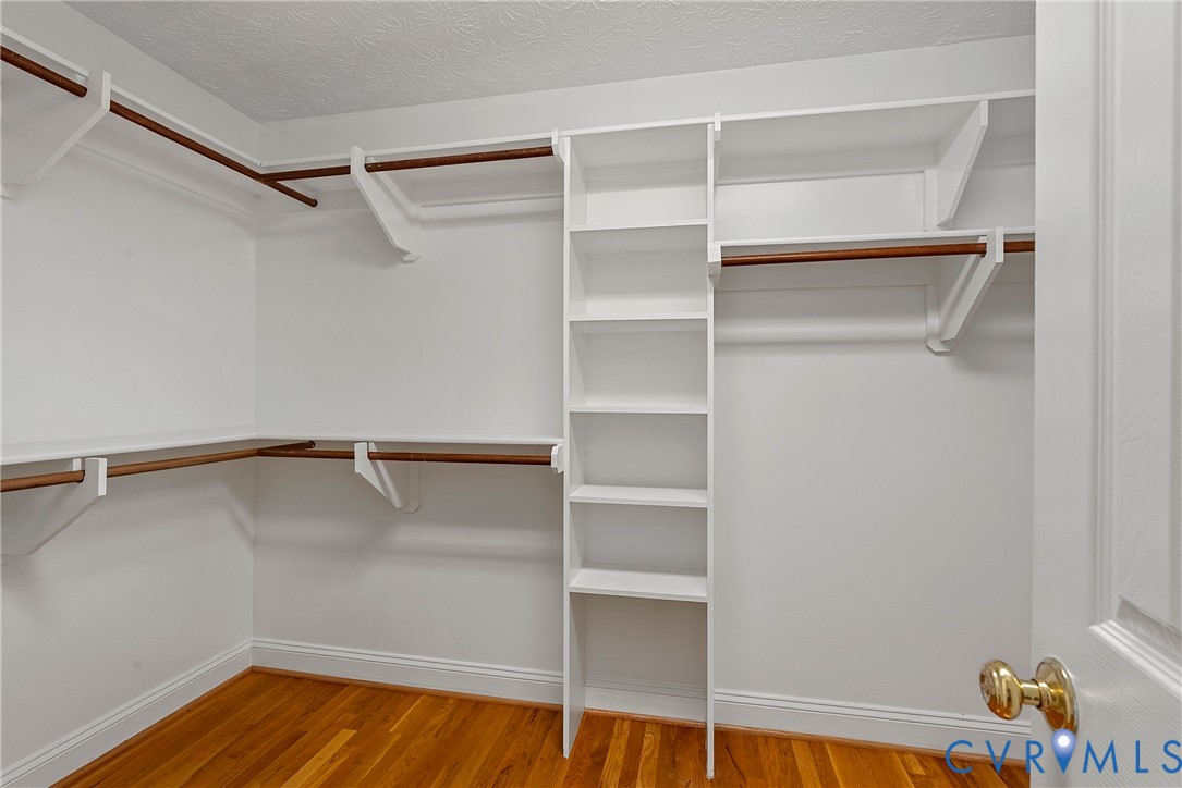 5213 Clipper Cove Road Midlothian, VA 23112 - Photo 50 of 73 Walk-in closet featuring white built-in shelving,