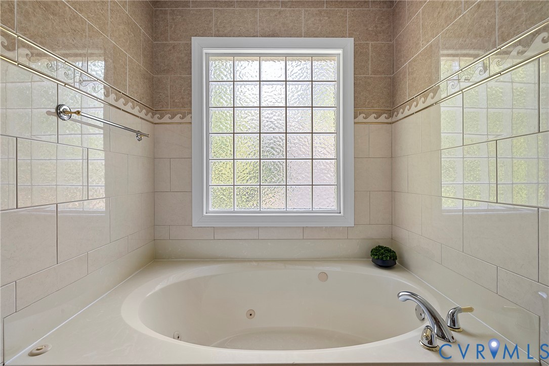 5213 Clipper Cove Road Midlothian, VA 23112 - Photo 53 of 73 Well-appointed bathroom featuring an inset bathtub