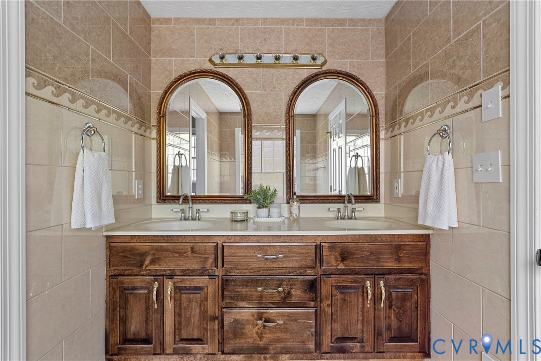 5213 Clipper Cove Road Midlothian, VA 23112 - Photo 54 of 73 Bathroom featuring a double vanity with wood cabin