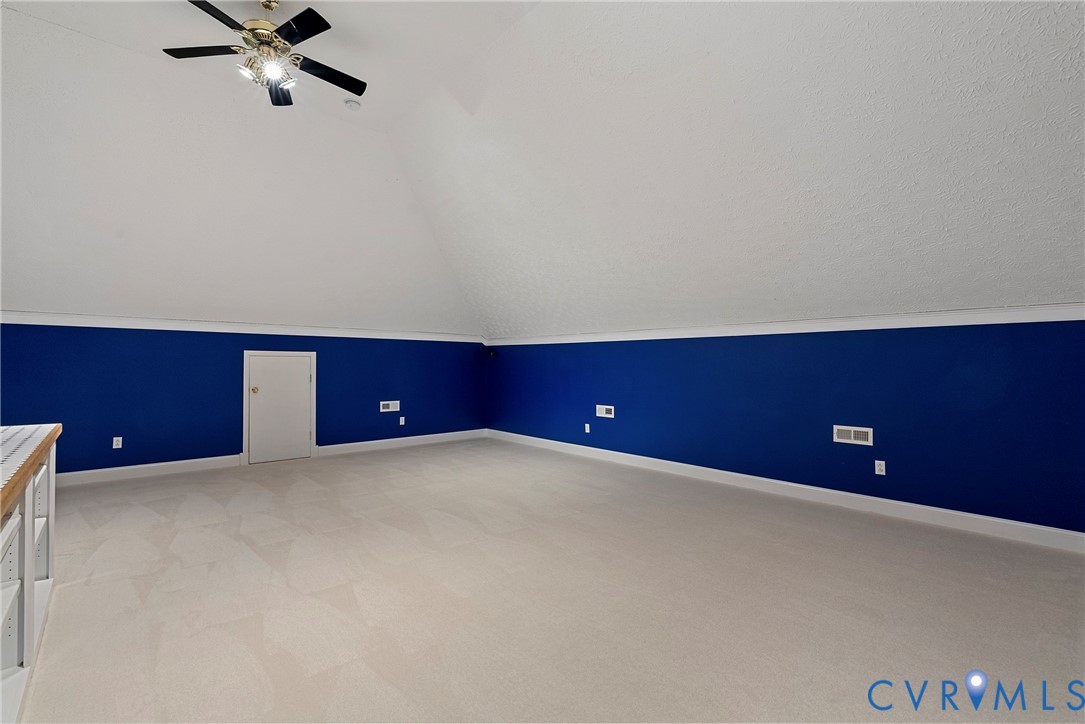 5213 Clipper Cove Road Midlothian, VA 23112 - Photo 59 of 73 Versatile room featuring a vaulted ceiling with a