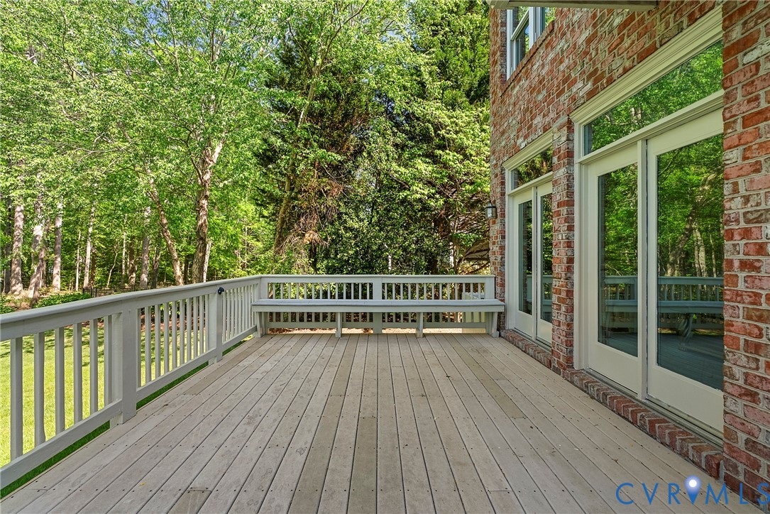 5213 Clipper Cove Road Midlothian, VA 23112 - Photo 66 of 73 Expansive outdoor deck with a built-in bench, offe