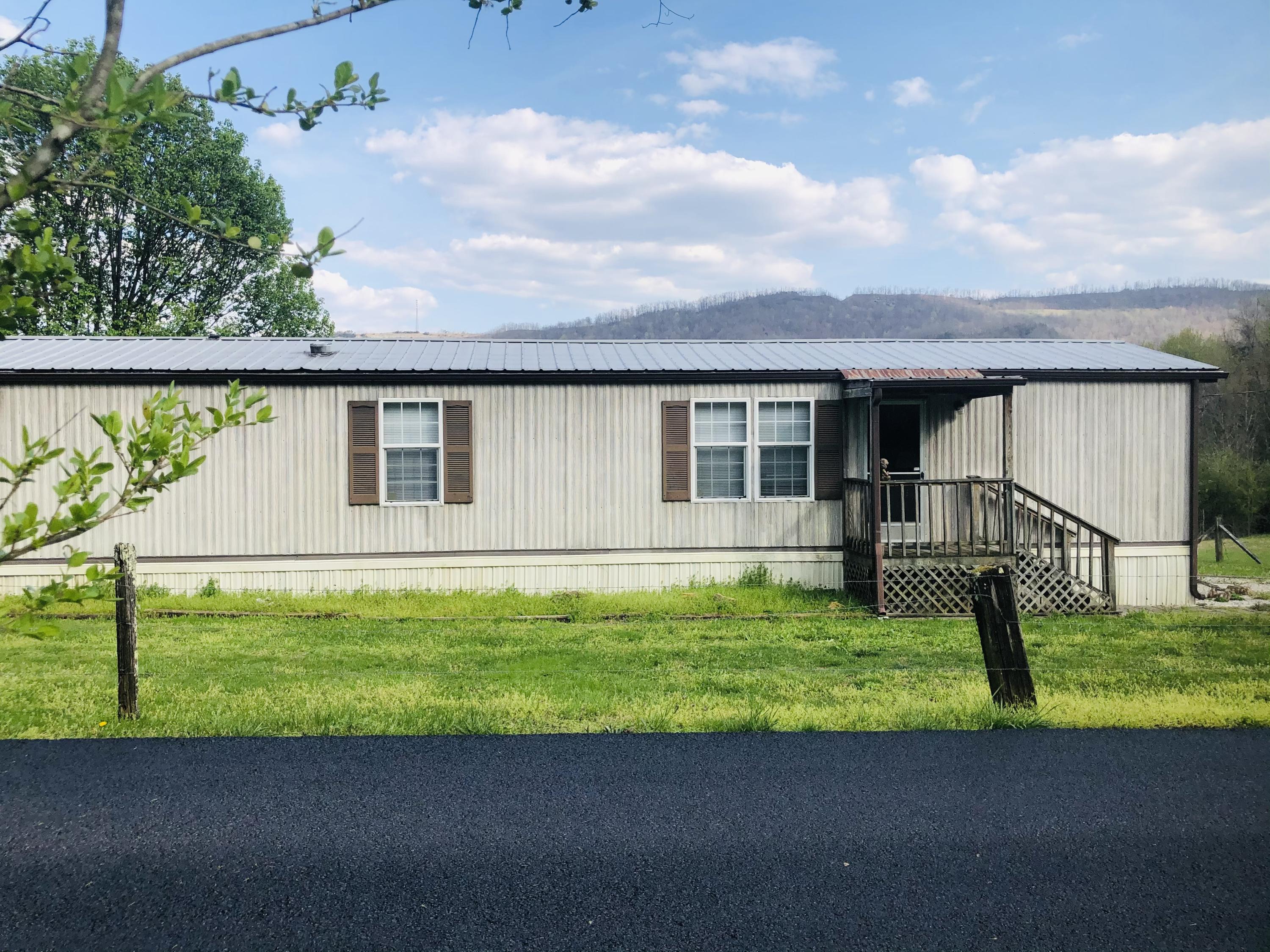 655 Newcomb Loop Road Newcomb, TN 37819 - Photo 1 of 8 C6EB1ADD-B7E5-4991-9924-7FE33218A7AD