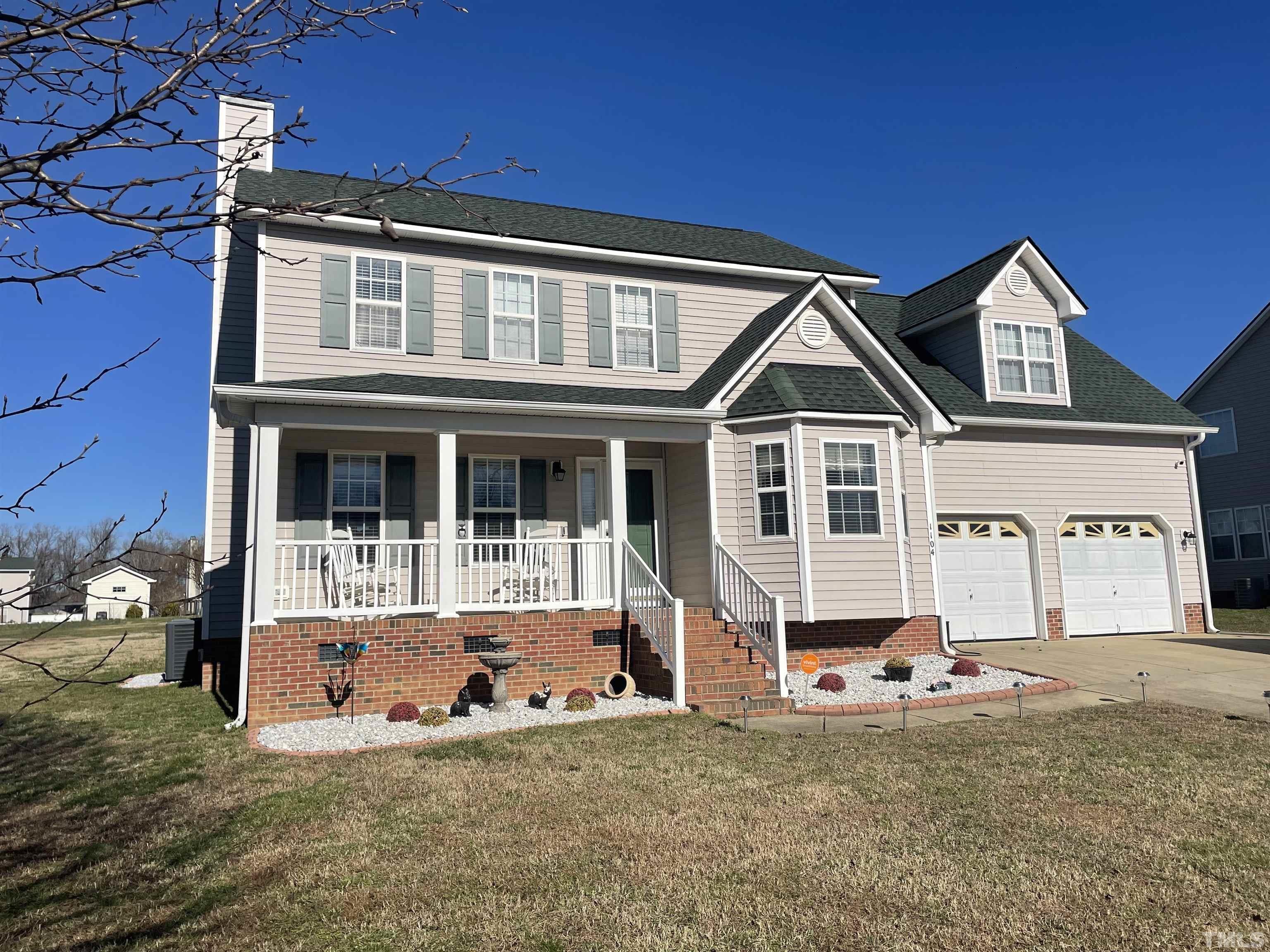1104 Feldmen Drive Raleigh, NC 27603 - Photo 1 of 23 a view of a house with wooden fence