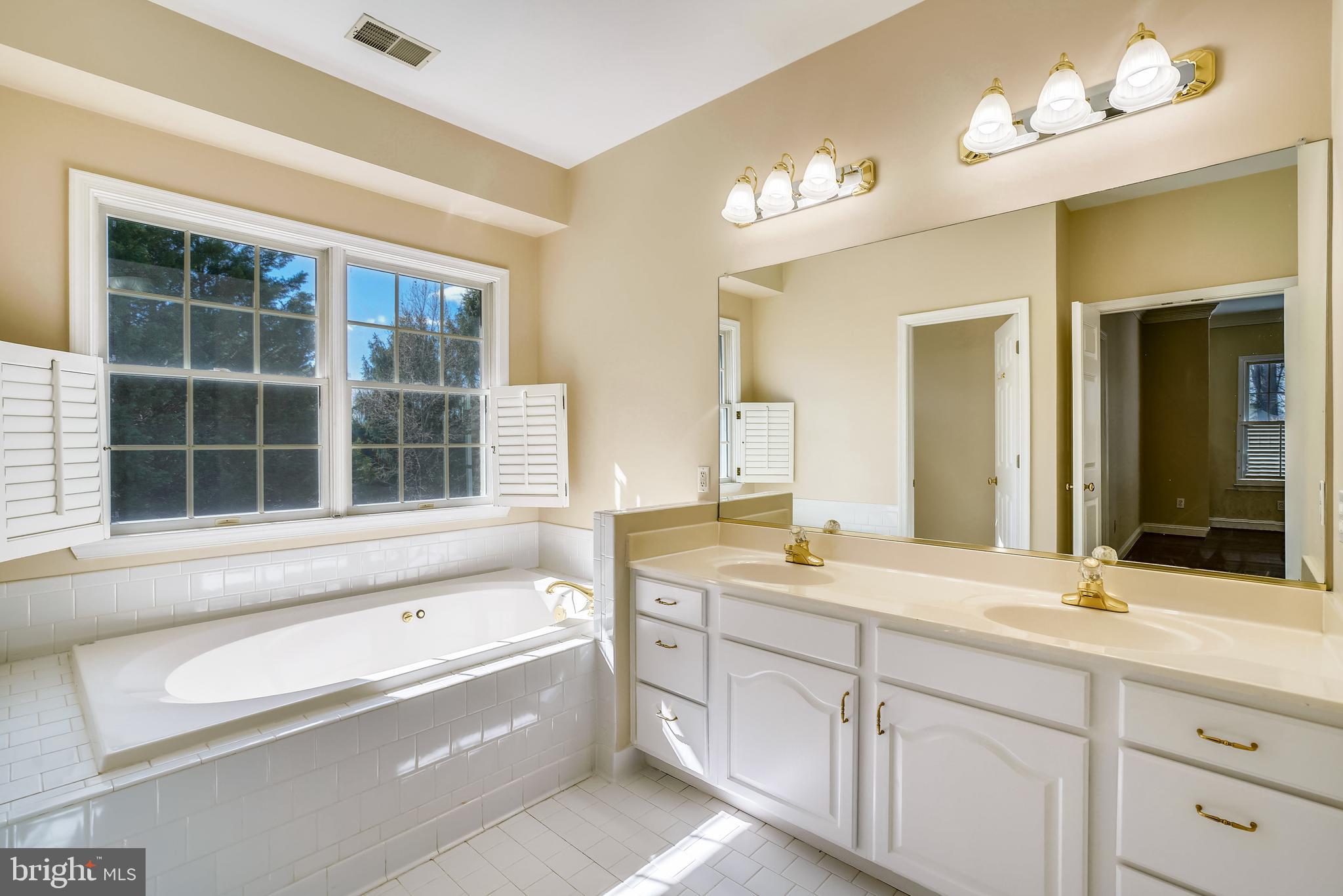 11862 Simpson Road Clarksville, MD 21029 - Photo 24 of 58 En suite Primary Bath, dual sinks, soaking tub